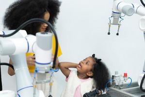 Children using the hand robot technology, Students are studying technology, which is one of the STEM courses. photo