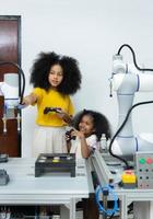 Children using the hand robot technology, Students are studying technology, which is one of the STEM courses. photo