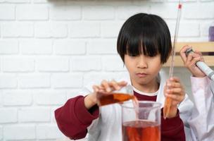 Little boy in science classroom It is the basis for the process of systematic thinking, reasoning, observation, data collection. as well as analysis for processing photo