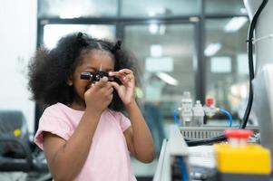 Youngsters utilizing the hand robot technology are having fun learning the electronic circuit board of hand robot technology, which is one of the STEM courses. photo