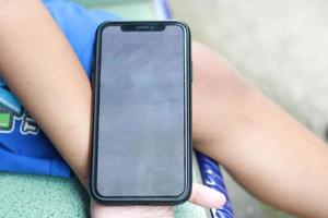 Photo of an empty cell phone held in hand