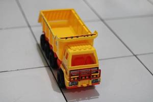 Photo of a yellow children's toy truck