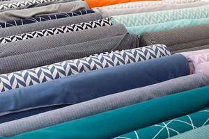 Samples of cloth and fabrics in different colors found at a fabrics market in Germany photo