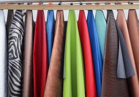 Samples of cloth and fabrics in different colors found at a fabrics market in Germany photo
