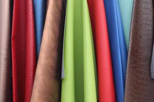 Samples of cloth and fabrics in different colors found at a fabrics market in Germany photo
