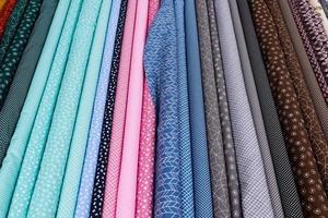 Samples of cloth and fabrics in different colors found at a fabrics market in Germany photo