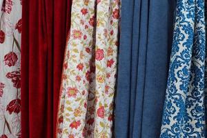 Samples of cloth and fabrics in different colors found at a fabrics market in Germany photo