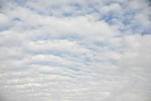 Clouds in sky. White clouds in summer. Summer weather. photo