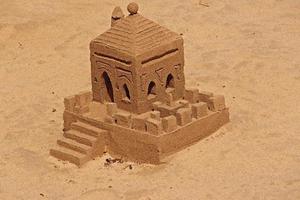 original sand structures on the beach on a beautiful warm sunny day by the ocean photo