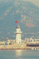 original landscape of the port and city of Alanya in Turkey from the sea photo