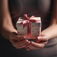 hands holding a gift box photo