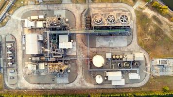 Aerial view of Oil and gas industry  facility for storage of oil and petrochemical products.Refinery oil and gas factory power and fuel energy.engineering concept. photo