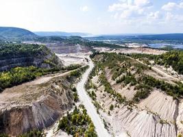 Bird's-eye view of limestone quarry in summer. photo