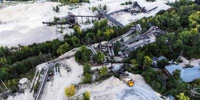 Aerial view of the slope of a crushed stone mining plant. photo