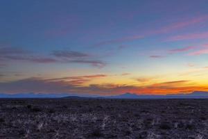 Orange red and pink clouds after sunset photo