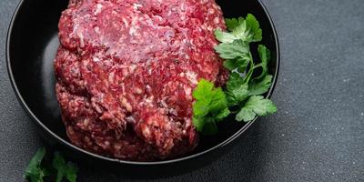 minced meat beef ground meat ready to cook healthy meal food snack on the table copy space food background rustic top view photo