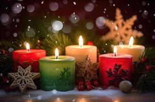 Burning candle and Christmas decoration over snow and wooden background. . photo