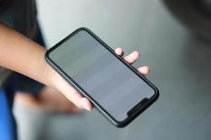 Photo of an empty cell phone held in hand
