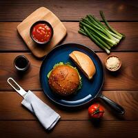 Hamburger with asparagus and ketchup on wooden background. photo