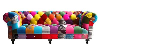 Chesterfield sofa from multi-colored fabric, patchwork, on a white background. . photo