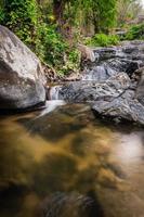 Khlong Nam Lai Waterfall, Beautiful waterfalls in klong Lan national park of Thailand photo