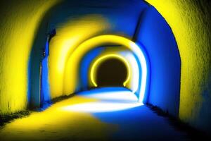 A blue and yellow tunnel with a yellow light at the end. photo