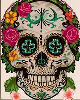 A colorful day of the dead skull with flowers and leaves photo