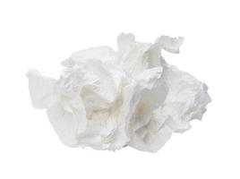 Single white screwed or crumpled tissue paper or napkin in strange shape after use in toilet or restroom isolated on white background with clipping path photo