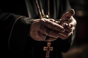 Church priest holds religious cross in hands. photo