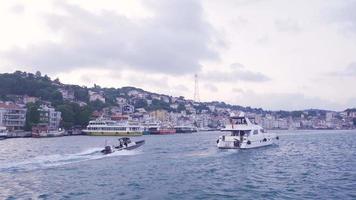 hips on the coastline and view of the city. General view of the city and yachts from the sea. video