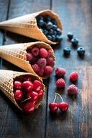 Fresh berry fruits in the cones photo