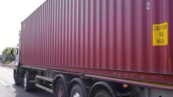 Container truck. Slow Motion. Cargo truck driving on city road. video