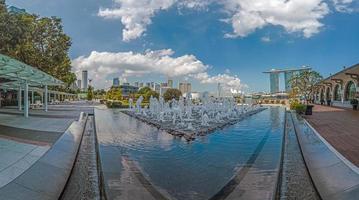 Panoramic view over fountain at Clifford Square in Singapore photo