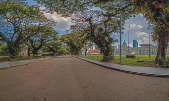 Panoramic image along deserted avenue in Singapore photo