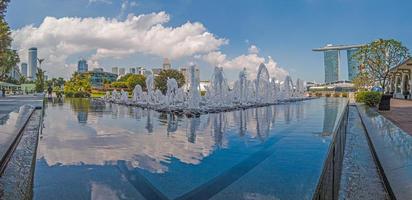 Panoramic view over fountain at Clifford Square in Singapore photo