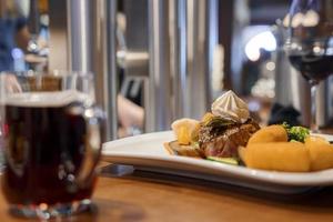 Fresh meal served in plate on table at restaurant photo