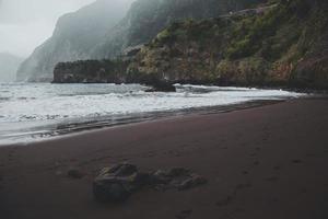 Waves at Seixal beach in Madeira, Portugal photo