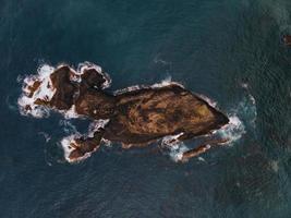 Drone view of Ilheu Vermelho in Madeira, Portugal photo