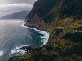 Drone view of Cascata do Corrego da Furna in Madeira, Portugal photo