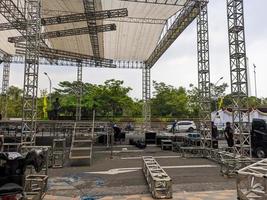 a stage being built for an event in surabaya, indonesia photo