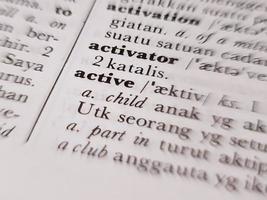 a close up of the word active in the English to Indonesian dictionary. For word background or wallpaper photo