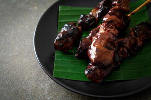 grilled chicken liver skewer in Asian style photo