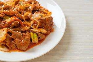 stir-fried pork with Korean spicy paste and kimchi photo