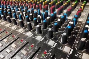 Close-up on a mixing board photo