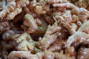 Stack of gingers on a market stall photo