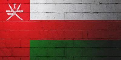 Flag of Oman painted on a wall photo