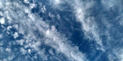 Sky clouds. Abstract blurred cyan gradient of spring sky. photo