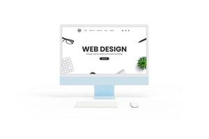 Isolated white computer display monitor with a web design studio concept page in front view. Keyboard and mouse beside. Showcasing website design concept photo