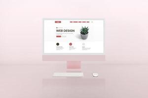 Web design studio with modern computer display and web page layout concept on it. Pink display and background photo