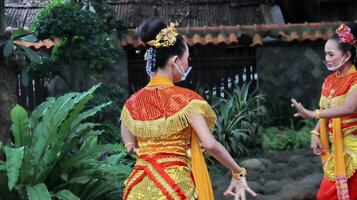 Javanese traditional dancer, dancing batik dance photo